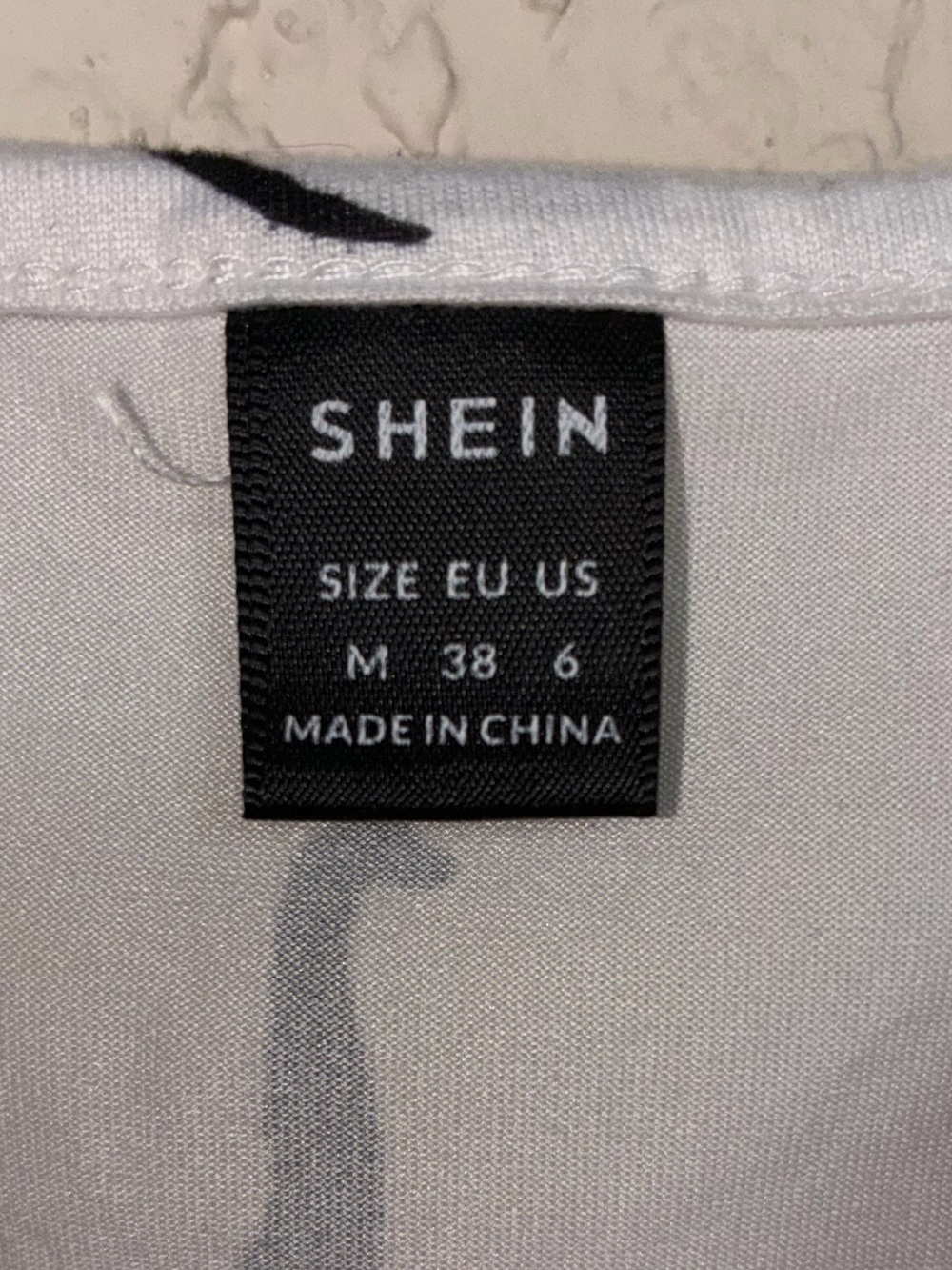 SHEIN White Tank Top with Black Graphic Print - Picture 2 of 3